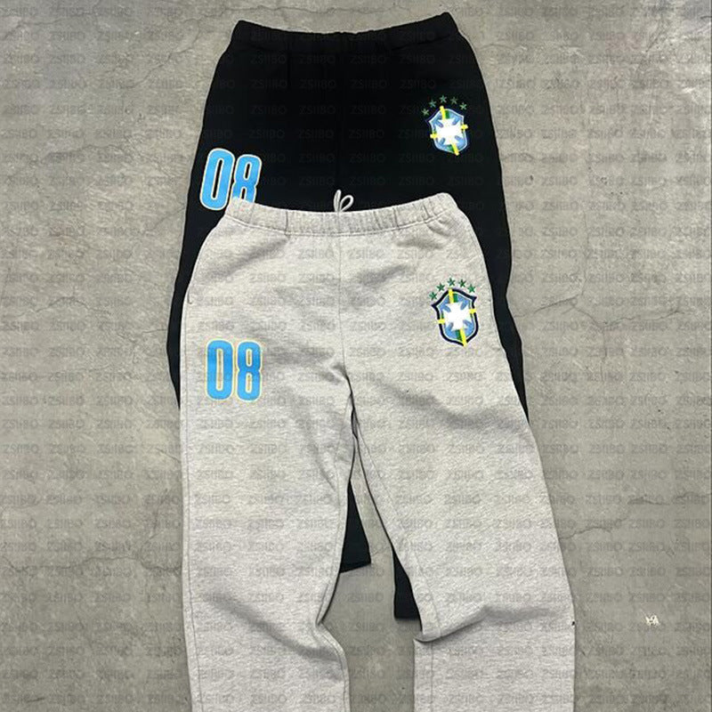 Women’s sporty jogging pants with practical side pockets and elastic waistband Chic & Stil