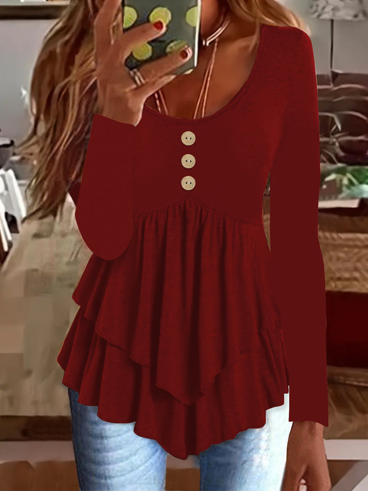 Long sleeve women's blouse with layered design and decorative button details Lune London