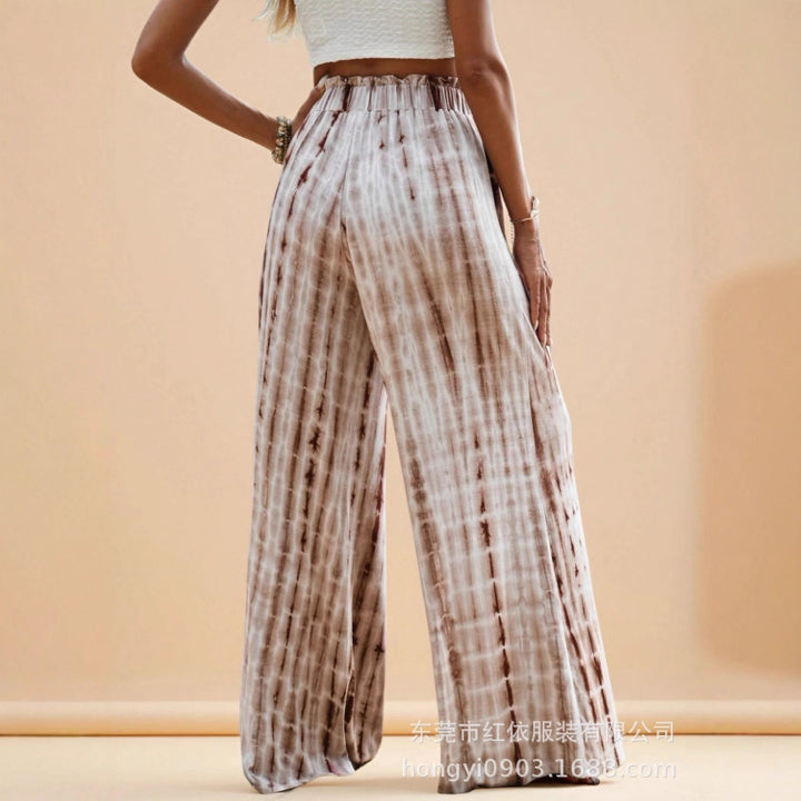 Pantalon d'été ample pour femmes avec taille élastique et motif batik unique Chic & Stil