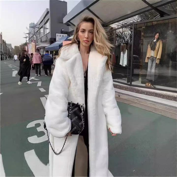 Oversized faux fur coat for women with hood and textured design Lune London