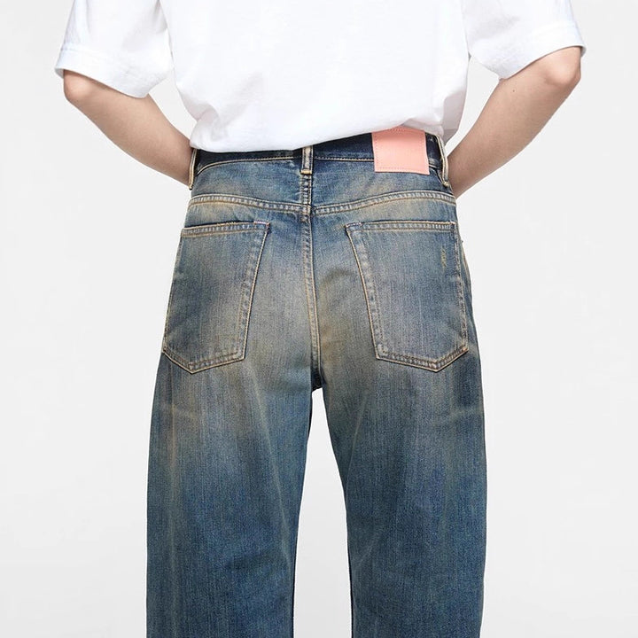 High-waisted jeans for women in a casual bootcut style with frayed hem Lune London