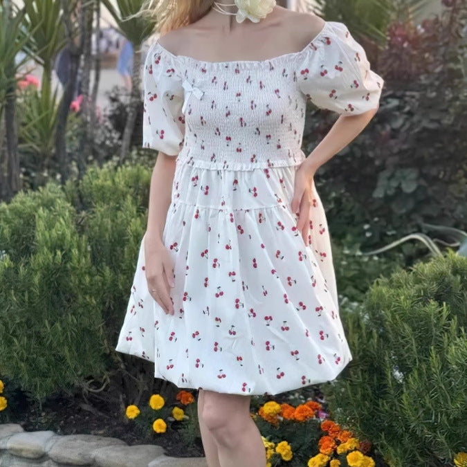 Summer dress for women with puff sleeves and a floral design Lune London