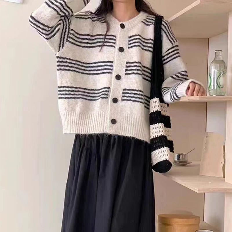 Fashionable knit jacket for women with a fine striped texture and decorative buttons Lune London