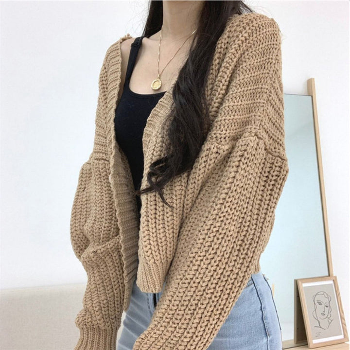 Ladies short cardigan with deep V-neck and special button details Lune London