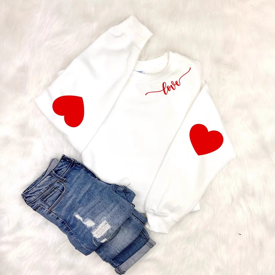 Sweatshirt femme avec design cœur et coupe décontractée Chic & Stil