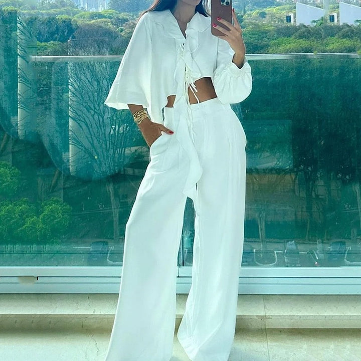 Ladies two-piece set with asymmetric cropped top and wide pants