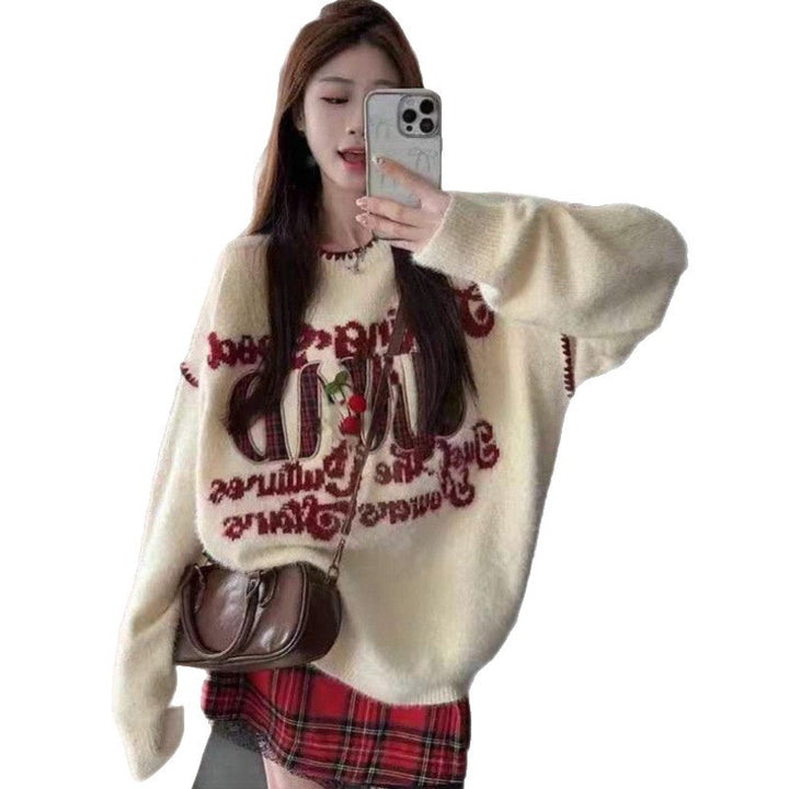 Pull féminin confortable avec lettering ludique et coupe décontractée Chic & Stil