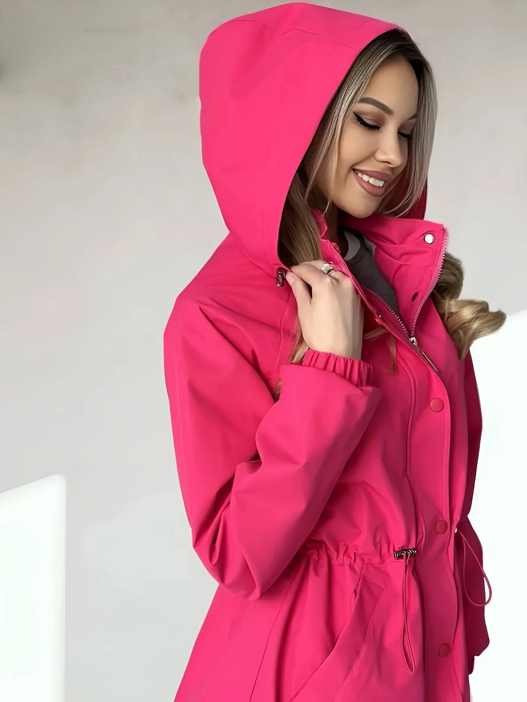 Women's waterproof leisure jacket with adjustable hood and elastic waist Lune London