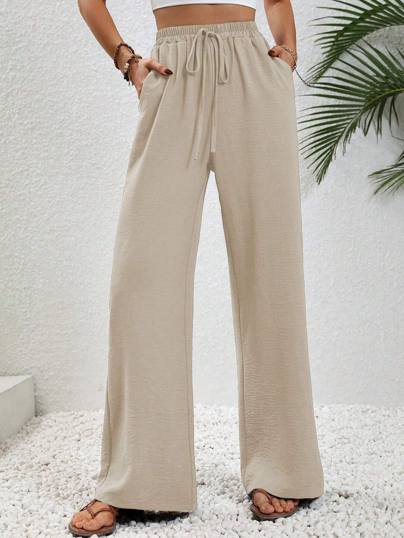 Pantalons larges d'été pour femmes avec taille élastique et poches latérales pratiques Chic & Stil