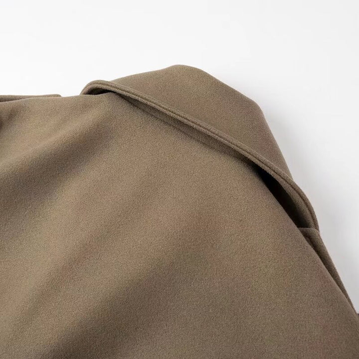 Veste de motard féminine élégante avec détail de ceinture et coupe décontractée Chic & Stil