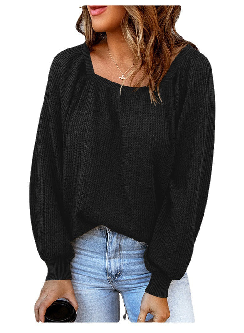 Oversized knitted sweater for women with an open neckline and puff sleeves Lune London