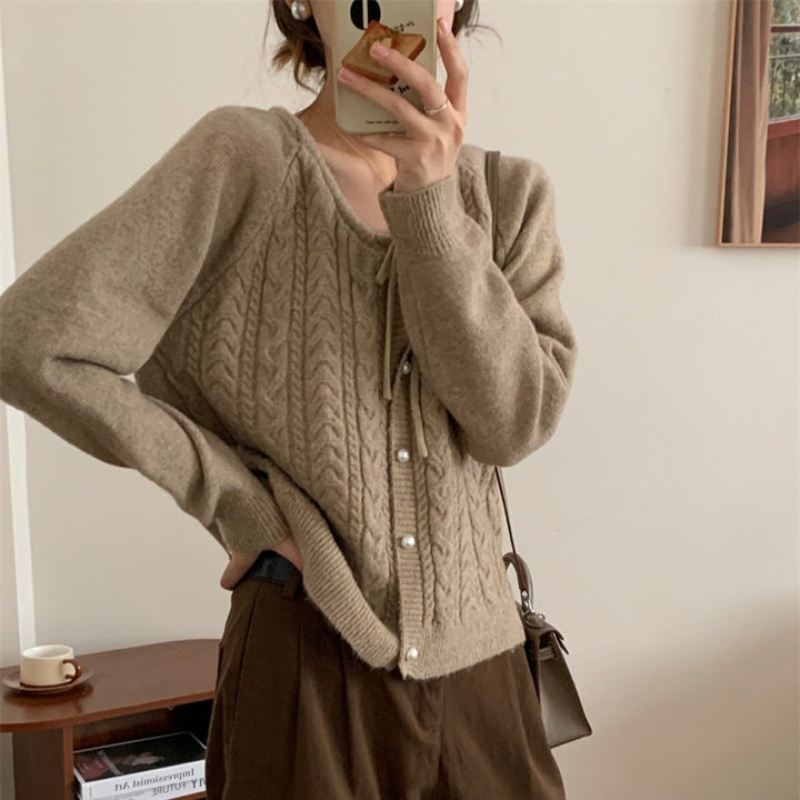 Chunky knit jacket for women with elegant pearl buttons and a structured design Lune London
