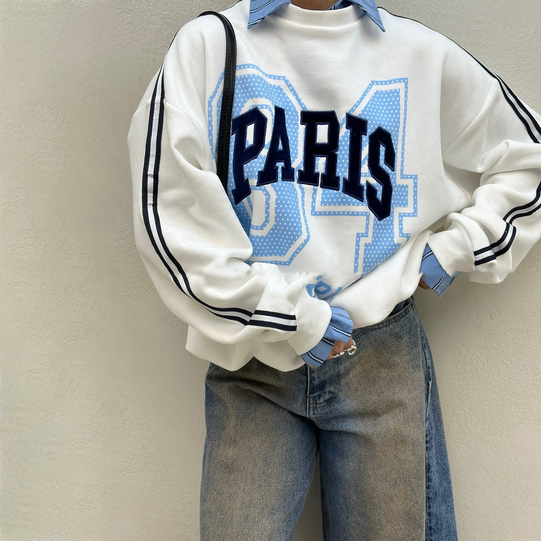 Oversized sweatshirt for women with Paris fashion print and striped accents Lune London