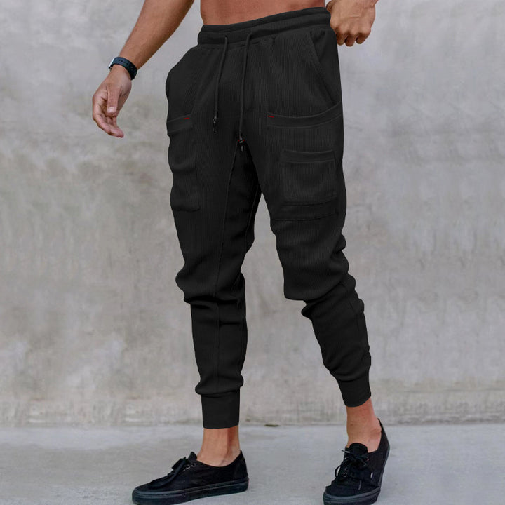 Trendy utility pants for men with elastic waistband and practical pockets Lune London