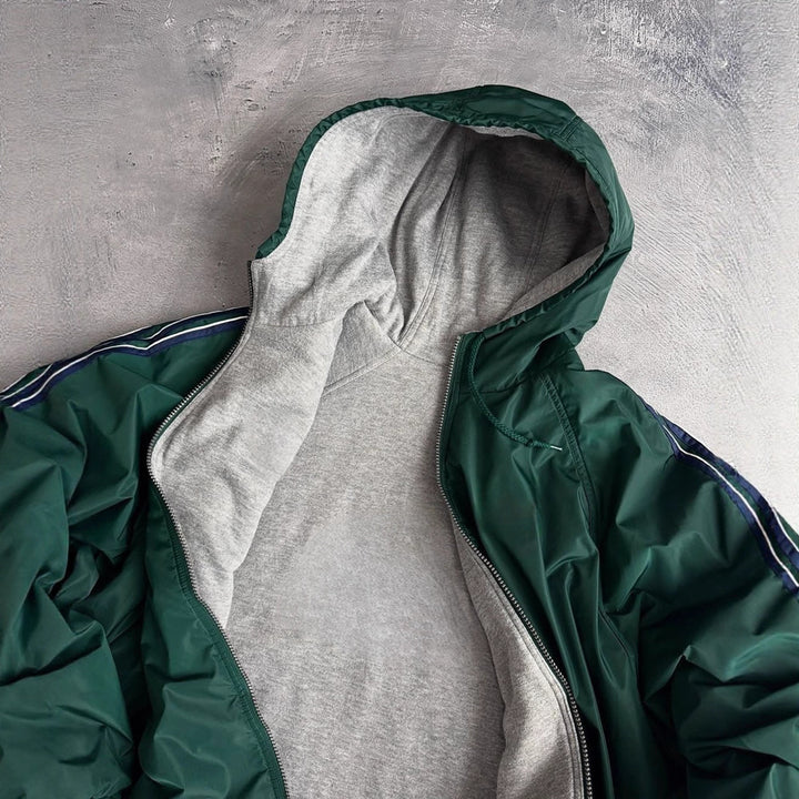 Veste de coupe-vent pour femmes avec capuche doublée et poches latérales Chic & Stil