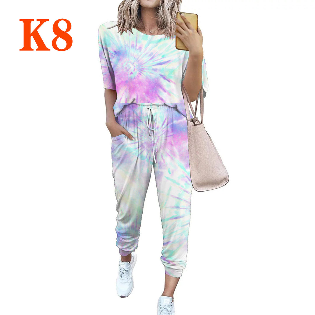 Ladies lightweight casual jumpsuit with a striking tie-dye pattern and practical pockets Lune London