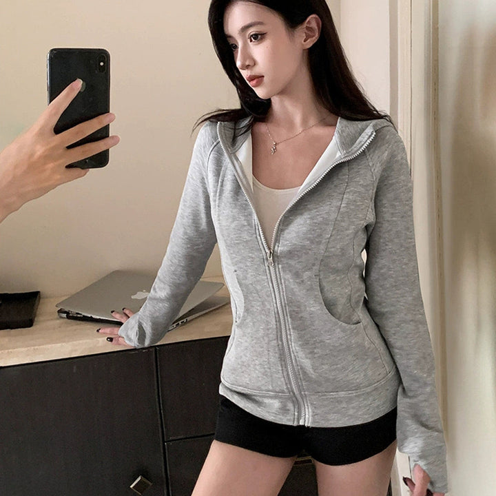 Veste à capuche sportive pour femmes avec fermeture éclair pratique Chic & Stil