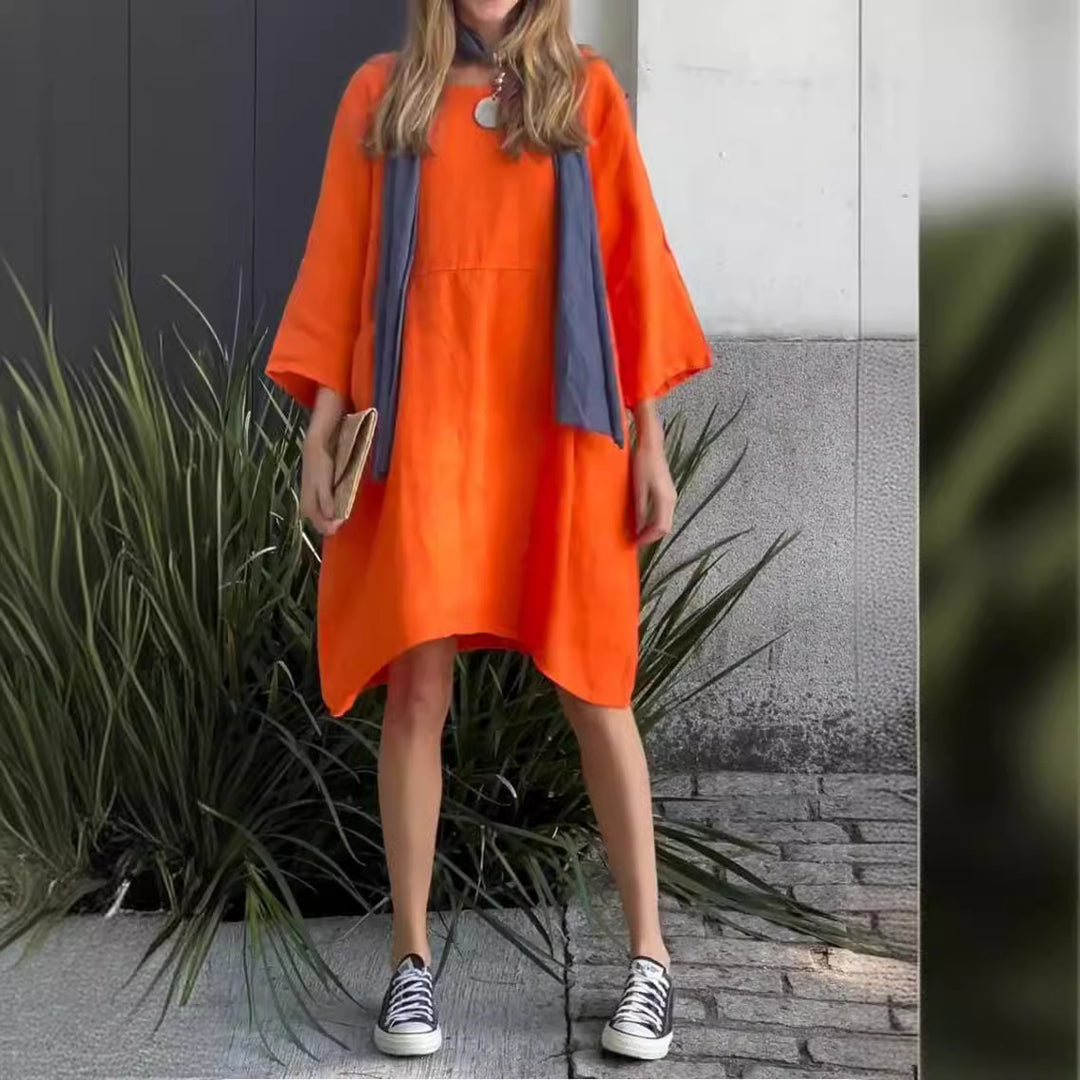 Casual linen dress for women with practical pockets and asymmetrical hem Lune London