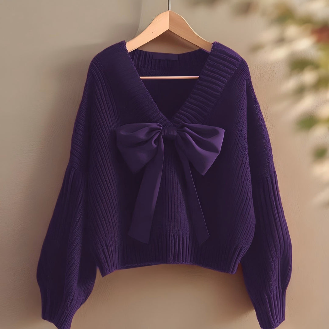 Knitted sweater for women with V-neck and decorative bow accent Lune London