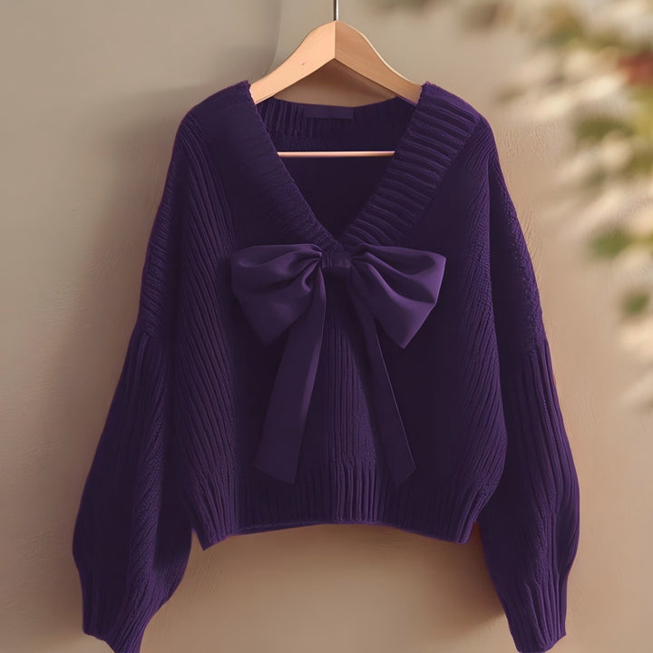 Knitted sweater for women with V-neck and decorative bow accent Lune London