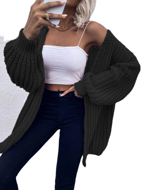 Thick knit cardigan for women with voluminous sleeves and a front opening Lune London
