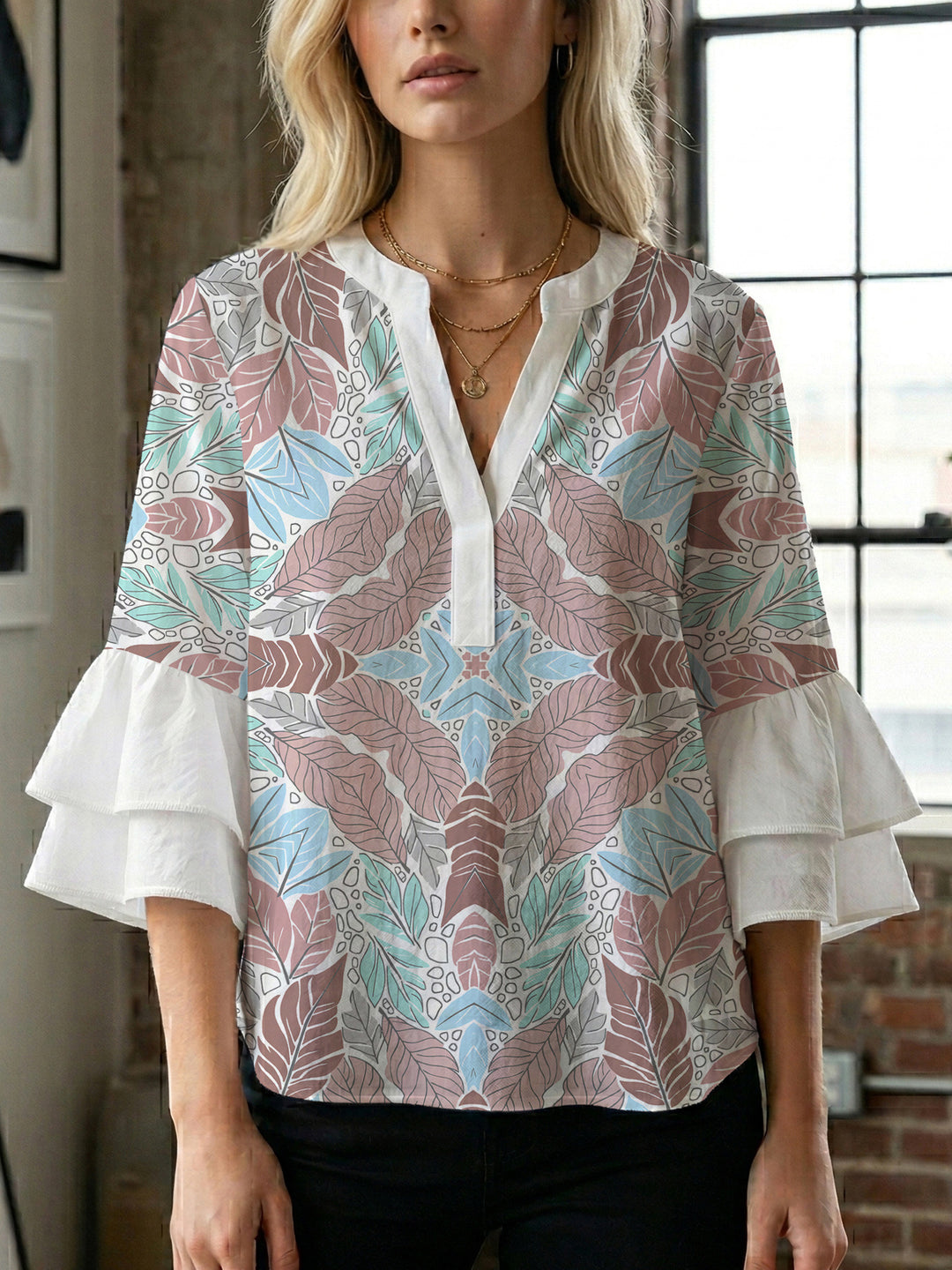 Ladies elegant top with voluminous ruffle hems and floral design Lune London