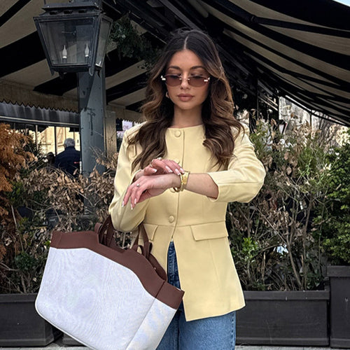 Elegant blazer jacket for women with a modern cut and a nice button detail Lune London