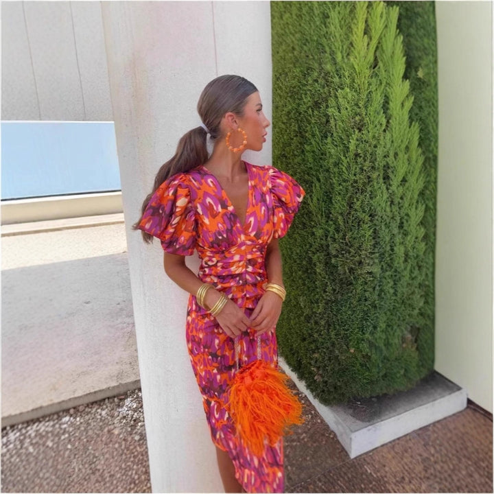 Midi dress for women with exciting puffed sleeves and a deep V-neck Lune London