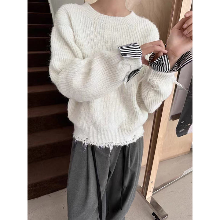 Pull en maille épaisse pour femmes avec des ourlets effilochés modernes et une coupe décontractée Chic & Stil