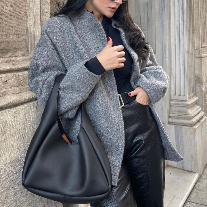 Ladies elegant oversized wool jacket with relaxed fit and textured fabric Lune London