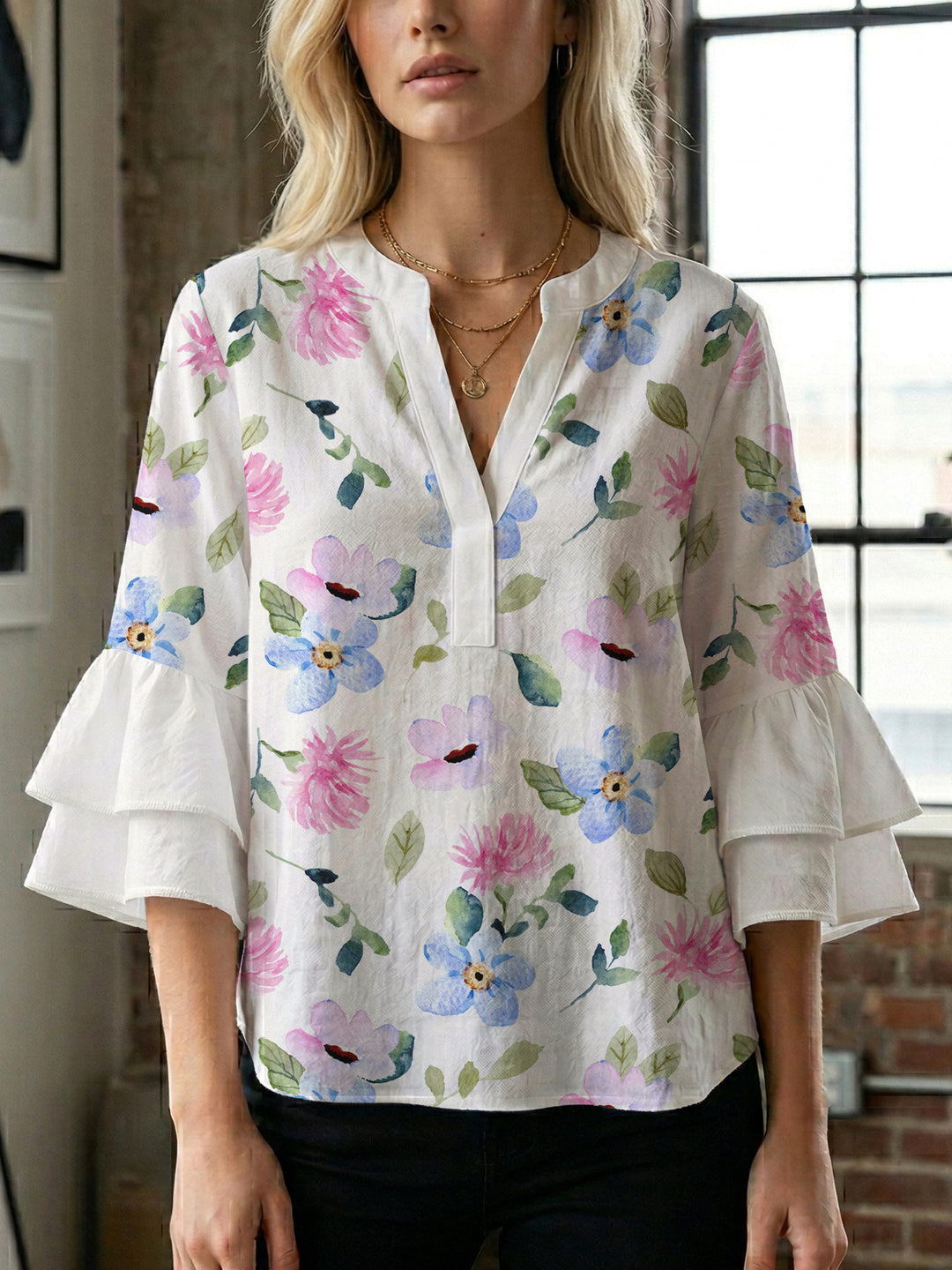 Ladies elegant blouse shirt with voluminous puff sleeves and graphic floral design Lune London