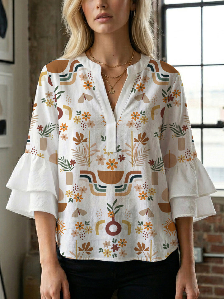Women's blouse with ruffle details and eye-catching animal print Lune London