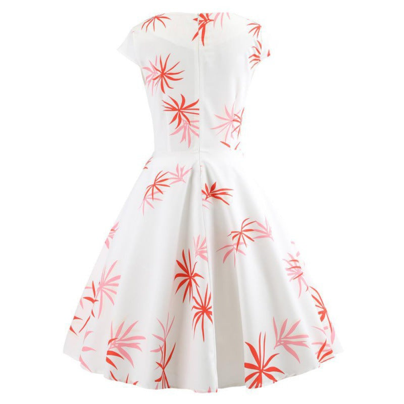 Robe à swing pour femmes avec un design enveloppant élégant et des accents floraux Chic & Stil