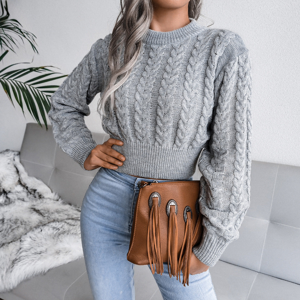 Chic and Style women's fashion sweater with twisted knit pattern and high cuffs