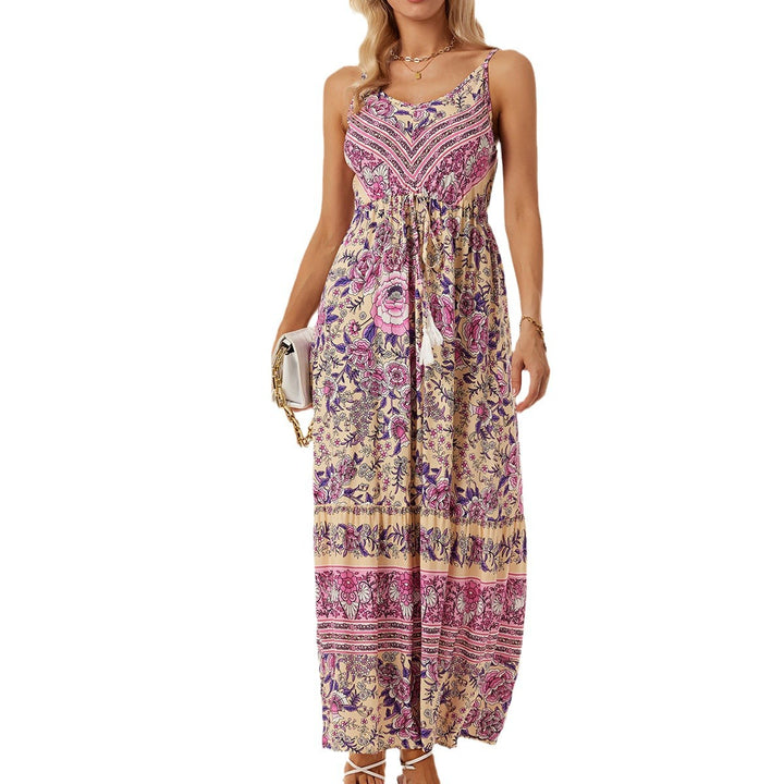 Airy maxi dress for women with a playful floral design and a drawstring at the waist Lune London