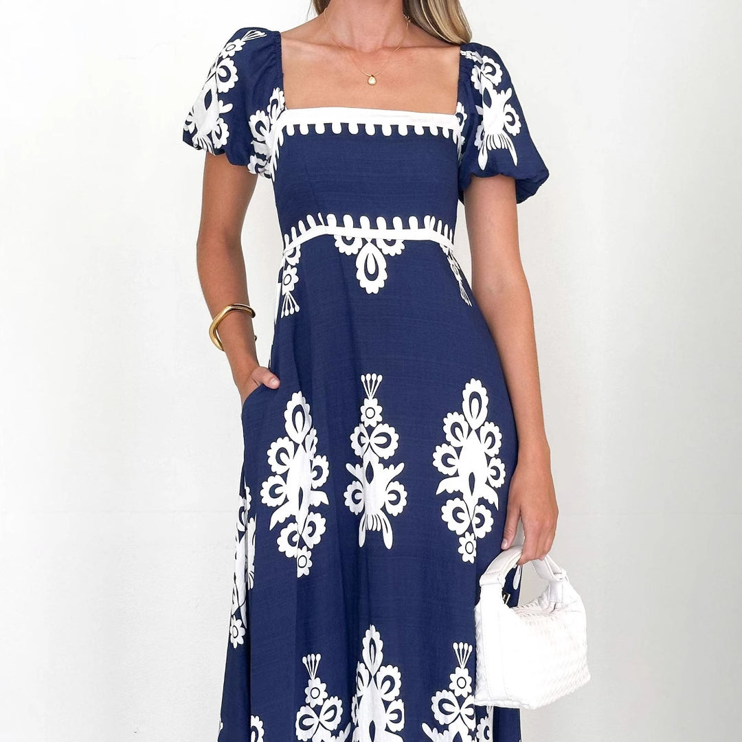 Maxi dress for women with decorative graphic pattern and puff sleeves Chic & Stil