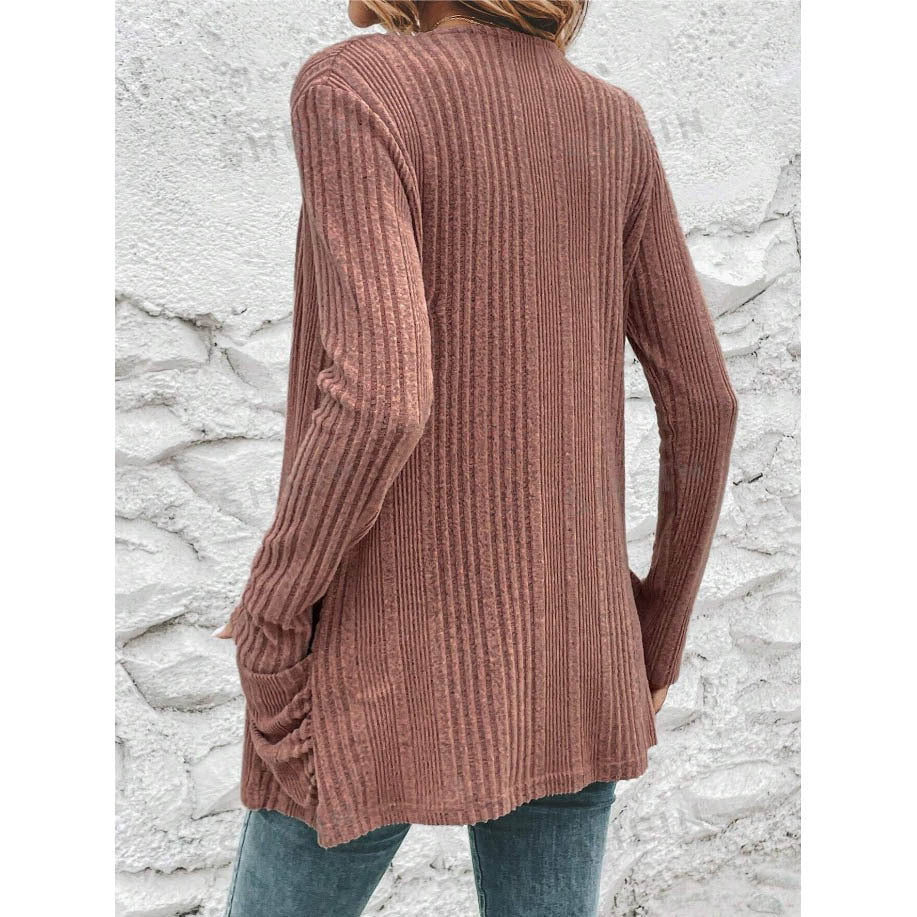 Knitted jacket for women with a stylish ribbed design and practical pockets Lune London