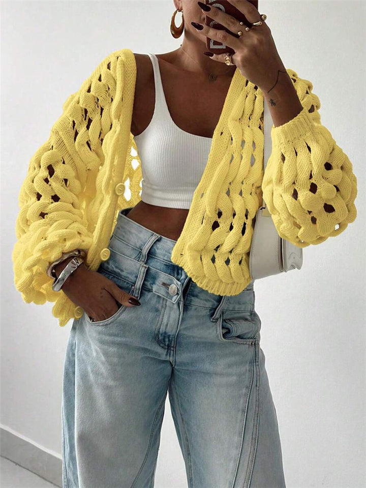 Women's knitted sweater with a unique hole pattern and a casual fit Lune London
