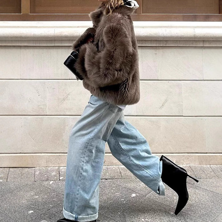 Ladies faux fur coat with high collar and luxurious design Lune London