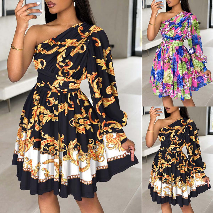 Women's dress with one shoulder, voluminous sleeves and a chic floral design