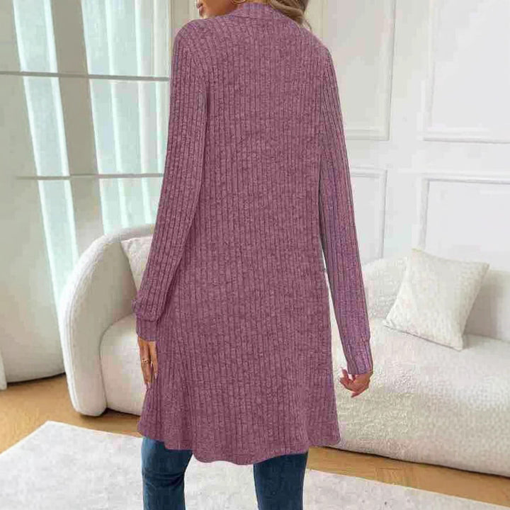 Knitted women's jacket with asymmetrical hem and practical pockets Lune London