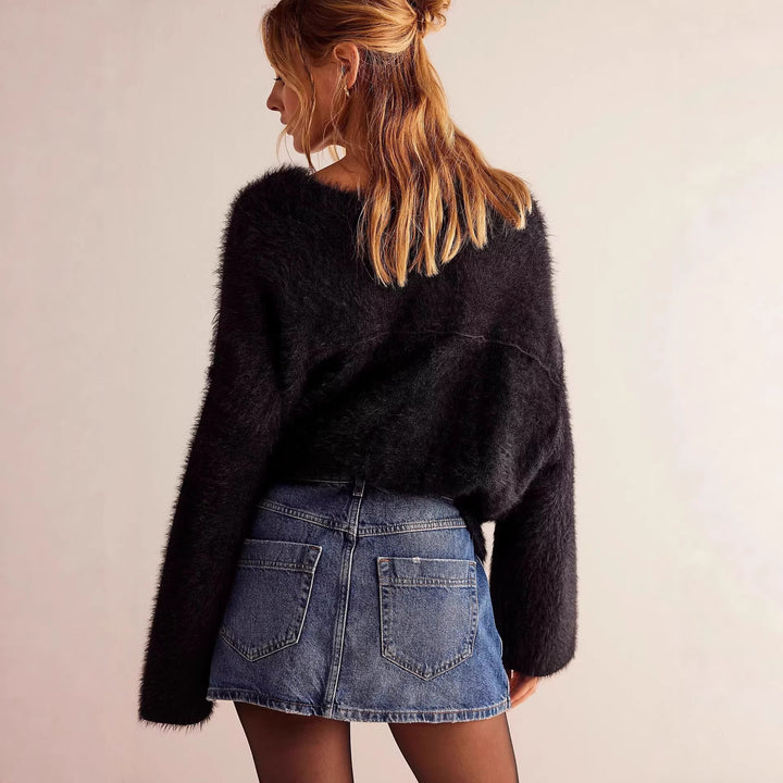 Women's fashionable A-line denim skirt with asymmetric button design and practical pockets Lune London