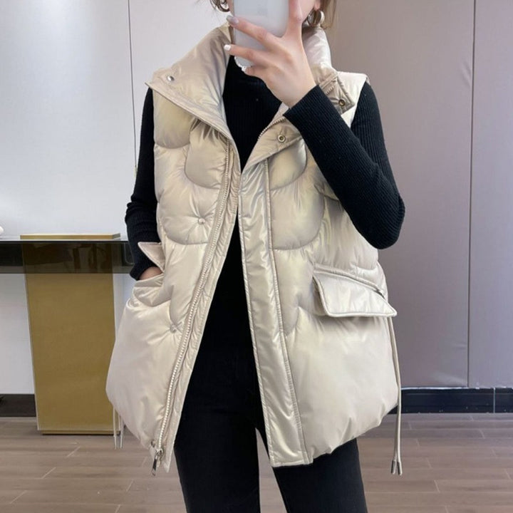 Ladies quilted gilet with high collar and zippered pockets on the sides Lune London