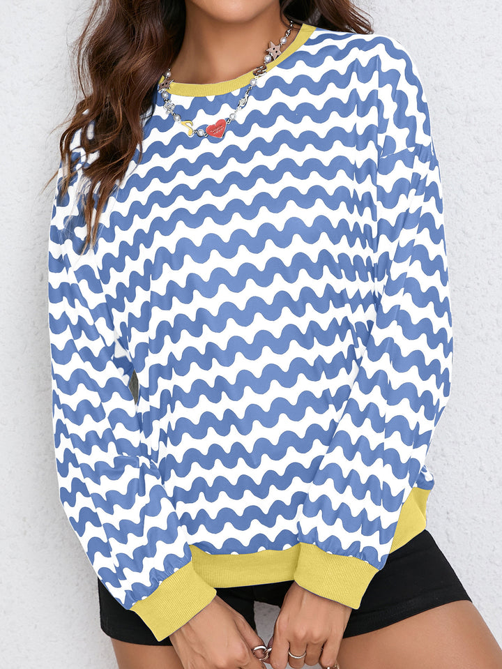 Sweat-shirt coloré pour femmes avec motif de vagues et coupe sportive Chic & Stil