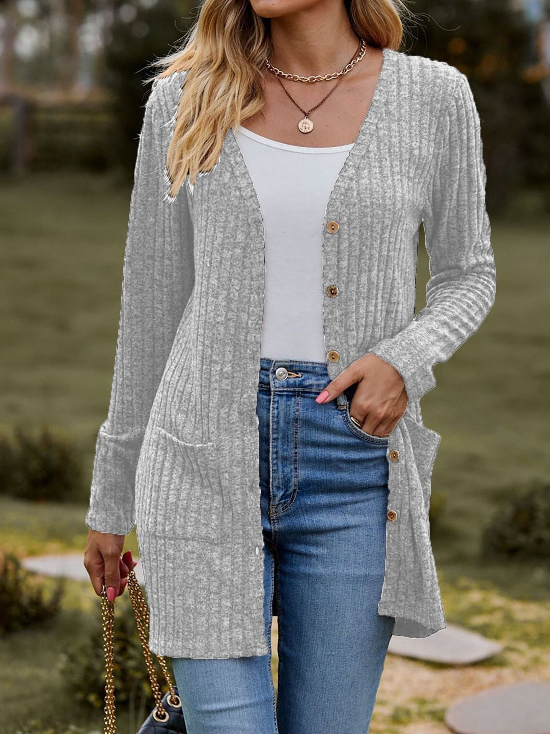 Women's knitted jacket with V-neck and practical pockets Lune London