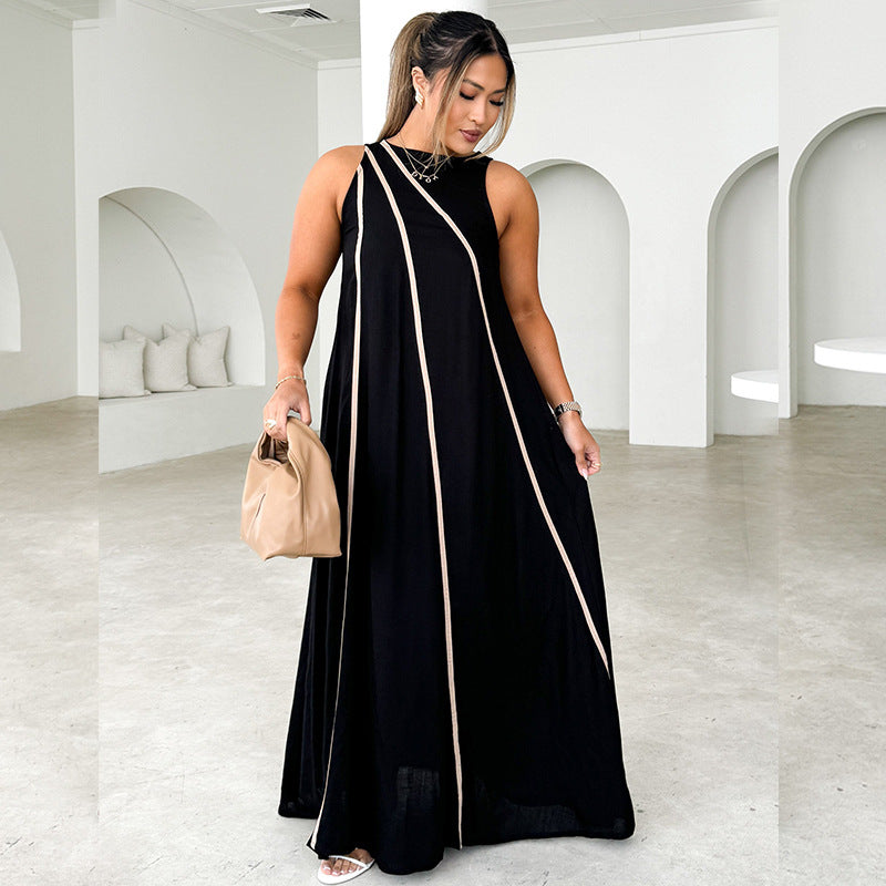 Women's maxi dress with asymmetric design and elegant contrast seams
