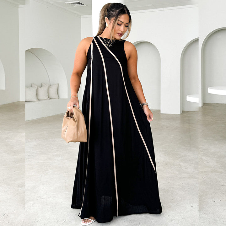 Women's maxi dress with asymmetric design and elegant contrast seams