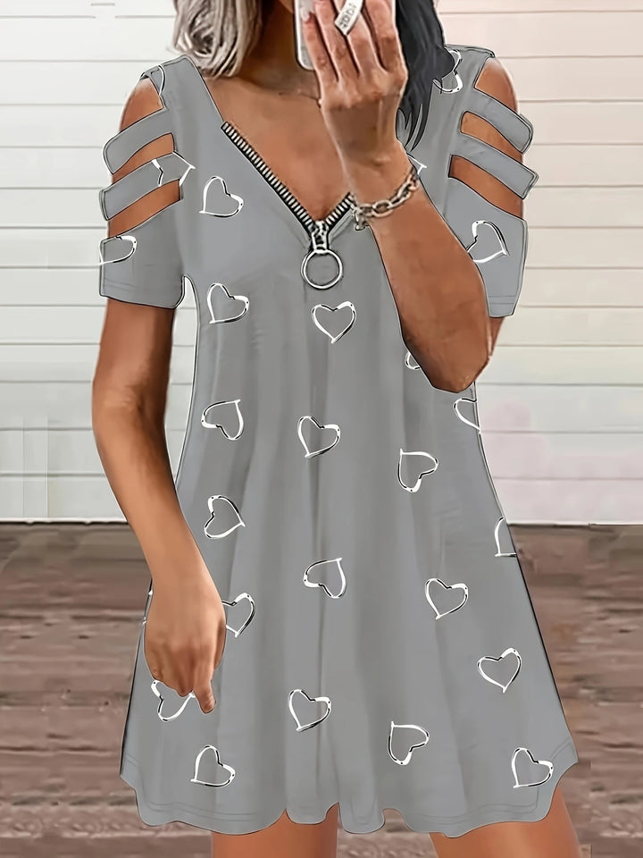 Casual dress for women with cut-out sleeves and heart pattern Lune London