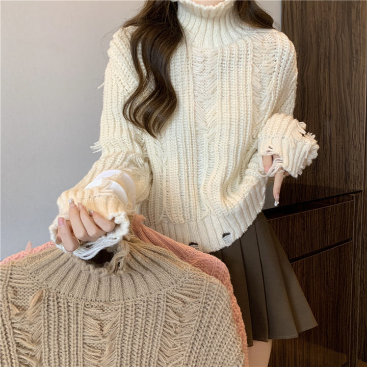 Pull en tricot épais pour femme avec col montant et éléments de design à franges Chic & Stil