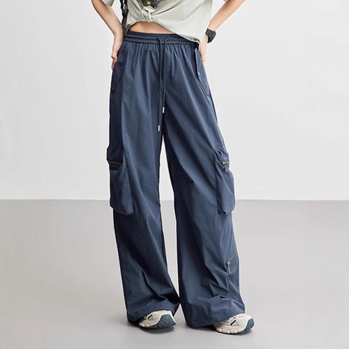 Functional cargo pants for women with elastic waist and practical zip pockets Lune London